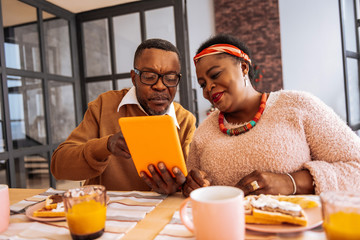 Nice afro American couple surfing the Internet