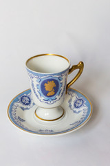 a white tea set with pattern on white background
