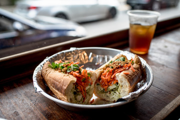 banh mi sandwhich by window sill