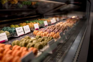 macaron cookies in bakery case