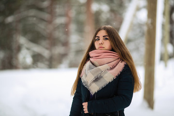 Portrait of a teen girl outdoors in winter.