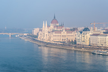 Fototapeta na wymiar View of Hungarian parliament at Danube river in Budapest city, Hungary