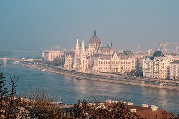Fototapeta premium View of Hungarian parliament at Danube river in Budapest city, Hungary