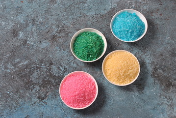 Spa and body care products. Colorful aromatic bath Dead Sea salt. Natural ingredients for homemade body salt scrub. Dead Sea cosmetics. Beauty skin care. Spa treatment.