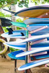 Colorful surf boards for rent in a beach of Bali, Indonesia