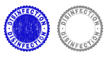 Grunge DISINFECTION stamp seals isolated on a white background. Rosette seals with grunge texture in blue and grey colors. Vector rubber watermark of DISINFECTION caption inside round rosette.
