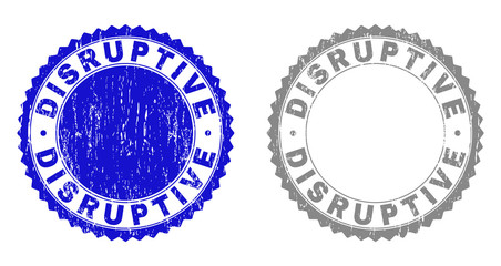 Grunge DISRUPTIVE stamp seals isolated on a white background. Rosette seals with distress texture in blue and gray colors. Vector rubber stamp imprint of DISRUPTIVE text inside round rosette.