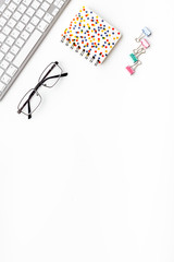 Office desk in order. Geometry. Computer keyboard and office supplies, glasses on white background top view space for text