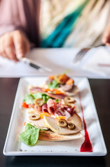 Carpaccio bread Foie gras, Pamaham, smoked duck bread and cranberries sauce