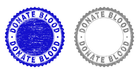 Grunge DONATE BLOOD stamp seals isolated on a white background. Rosette seals with grunge texture in blue and grey colors. Vector rubber overlay of DONATE BLOOD caption inside round rosette.