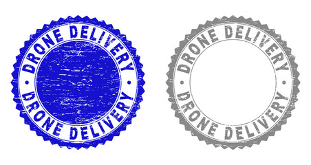 Grunge DRONE DELIVERY stamp seals isolated on a white background. Rosette seals with grunge texture in blue and gray colors. Vector rubber stamp imprint of DRONE DELIVERY tag inside round rosette.
