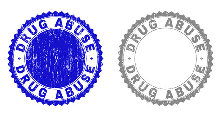 Obraz premium Grunge DRUG ABUSE stamp seals isolated on a white background. Rosette seals with grunge texture in blue and grey colors. Vector rubber watermark of DRUG ABUSE tag inside round rosette.