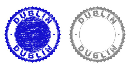 Obraz premium Grunge DUBLIN stamp seals isolated on a white background. Rosette seals with grunge texture in blue and grey colors. Vector rubber stamp imitation of DUBLIN tag inside round rosette.