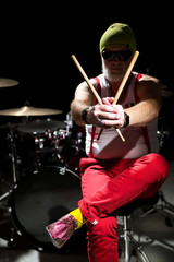 Drummer with a drumstick