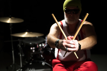 Drummer with a drumstick