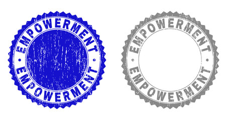 Grunge EMPOWERMENT stamp seals isolated on a white background. Rosette seals with distress texture in blue and grey colors. Vector rubber stamp imprint of EMPOWERMENT title inside round rosette.
