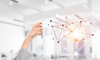 Business and technology concept with networking grid and man using device