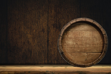 Wooden barrel and worn old table of wood.
