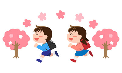 走る小学生の男の子・女の子（春）