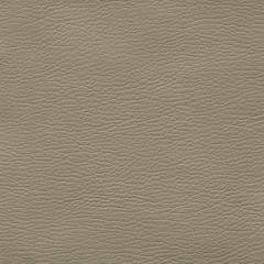 Creamy, brown, light leather background. Vintage fashion background for designers and composing collages. Luxury textured genuine leather of high quality.