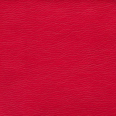 Red leather textured background. Vintage fashion background for designers and composing collages. Luxury textured genuine leather of high quality.