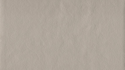 Fototapeta na wymiar Creamy, brown, light leather background. Vintage fashion background for designers and composing collages. Luxury textured genuine leather of high quality.