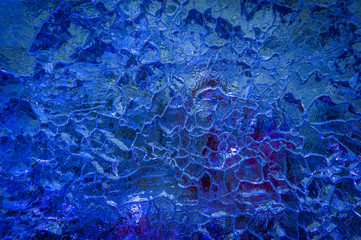 Blue light. Ice texture background. Close-up.Soft focus.