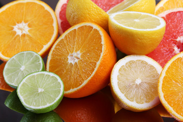 Fototapeta na wymiar Mix of citrus fruits cut in different forms