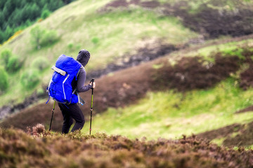 backpacker in mountains