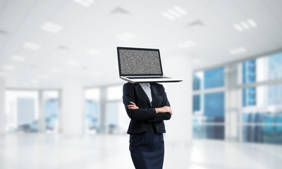 Business woman with laptop instead of head.