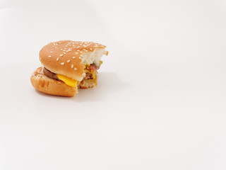 fast food bitten burger on white background