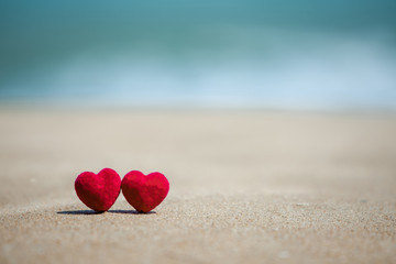 Fototapeta premium red heart on the beach