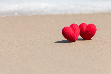 Fototapeta premium red heart on the beach