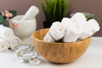 Spa still life with aromatic candles, flower and towel. - Image.