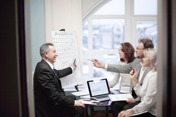 group of senior businessmen discussing a new business project.