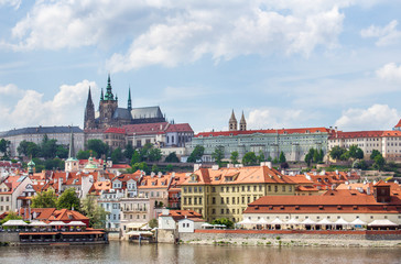 Fototapeta na wymiar View of Prague and Prague Castle from Charles Bridge. Vltava River. Architecture of Prague old town
