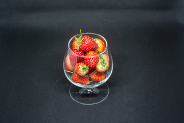 Red strawberry fruit for fresh food or a food ingredient can see at many markets or supermarket in Thailand 