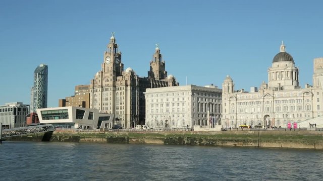 POV of ferry coming into pierhead at Liverpool waterfront skyline, England