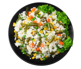 black plate with white rice, green peas, canned corn kernels, cut green beans isolated on white background. top view