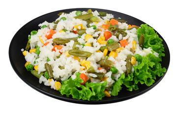 black plate with white rice, green peas, canned corn kernels, cut green beans isolated on white background