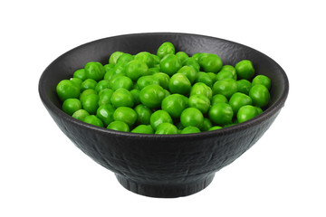 green peas in black bowl isolated on white background