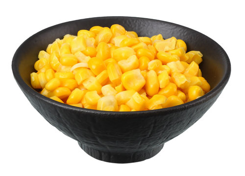 black bowl with canned corn kernels isolated on white background