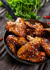 Roasted chicken wings in hot pepper and sesame