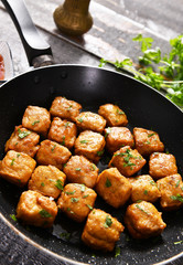 Small meat squares from the pan