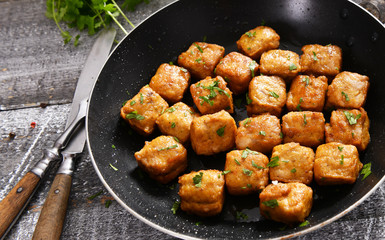 Small meat squares from the pan