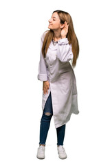 Full body Young doctor woman listening to something by putting hand on the ear on isolated background