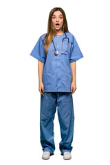 Full body Young nurse with surprise and shocked facial expression on isolated background