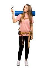 Full body Young backpacker woman holding a credit card and thinking on isolated background