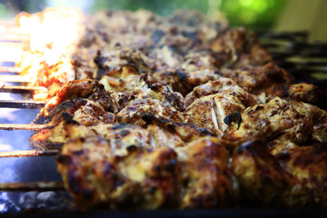 Shish kebab on the grill with smoke.