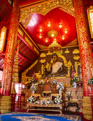 CHIANG RAI, THAILAND - JANUARY 5: Interior of Thai northern temple and Buddha sculpture on January 5, 2015 in Wat Phra Kaeo. This Temple is famous as the original home of the translucent green Buddha.